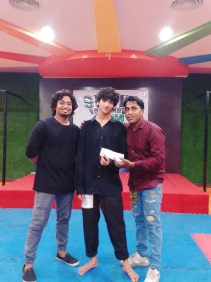 Our instructors congratulating a student on his selection for a major dance championship. This is a testament to his dedication and our rigorous training program.