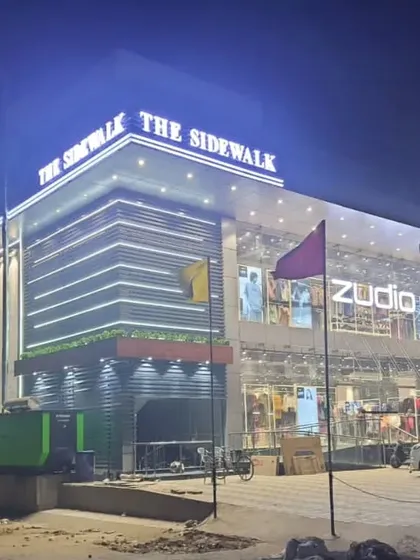 My work extends to large-scale commercial projects. This is "The Sidewalk" in Ghaziabad, a commercial building I designed and executed. The facade lighting and modern design create a powerful street presence, attracting businesses and customers alike.