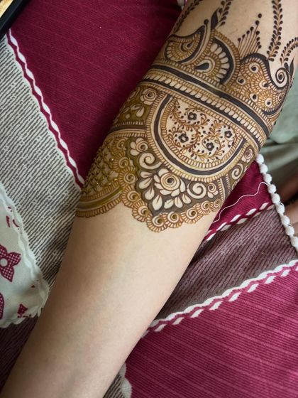This is a close-up of the elbow band, showing the clean lines and detailed patterns that continue up the arm. I make sure every part of the design is given full attention.