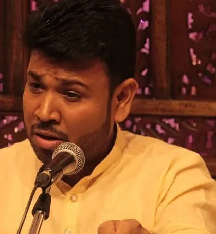A close-up of a guest vocalist, deeply engrossed in his performance at our Swarveni Baithak. We focus on creating an environment where artists can express themselves with complete freedom and honesty.