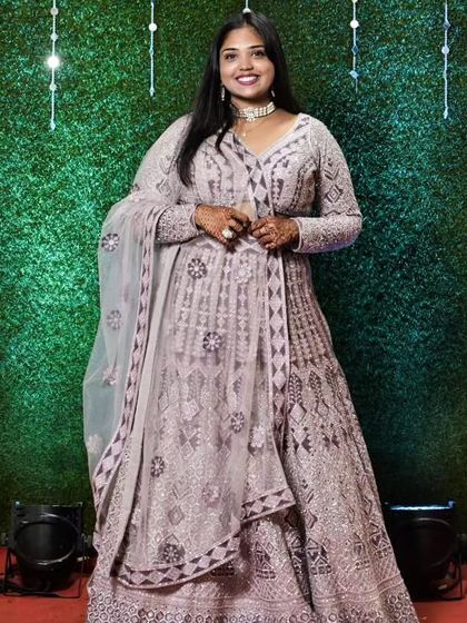 A full-length view of our client in the lavender lehenga. The A-line silhouette is flattering for all body types and the embroidery is simply stunning.