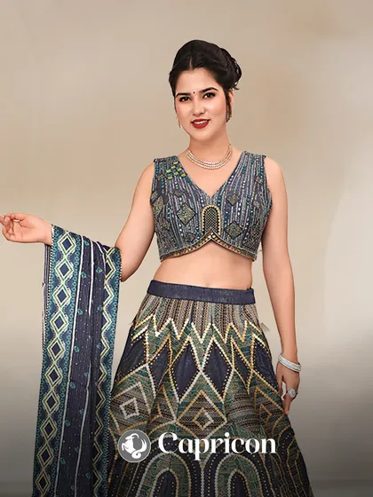 Capricorn, you are all about timeless sophistication. This navy blue lehenga with geometric patterns is as classic and ambitious as you are.