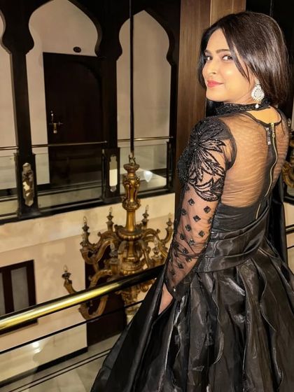 A duplicate of 168, showing the beautiful back details of the gown.