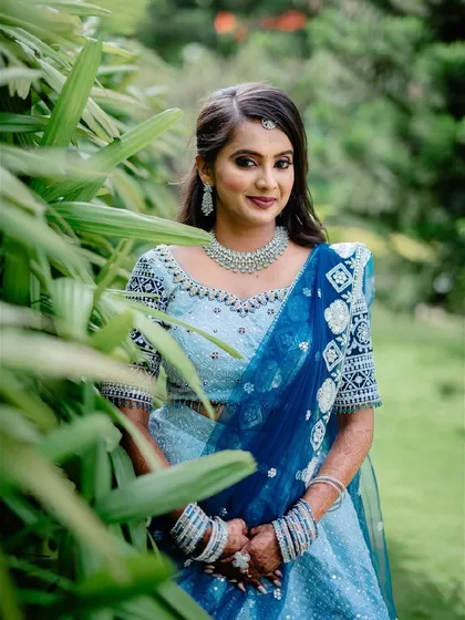 For our beautiful client Akshitha, we created this dreamy blue lehenga. My goal is always to make you feel like you are in a fairytale on your special day, and this custom outfit did just that.