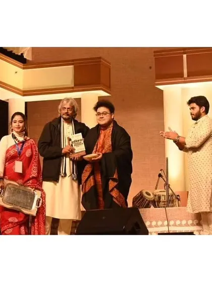 A moment of felicitation on stage at the West Bengal State Music Academy's Annual Festival.