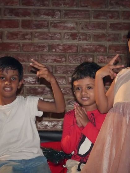 The kids are having a blast. Their happy faces and peace signs show that Sherlock's is a fun place for the younger generation too.