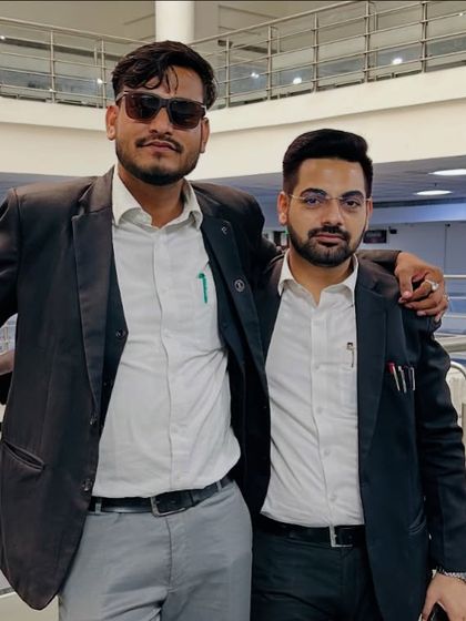 With a friend and fellow advocate. The bonds of friendship in this profession are forged in the fires of the courtroom.