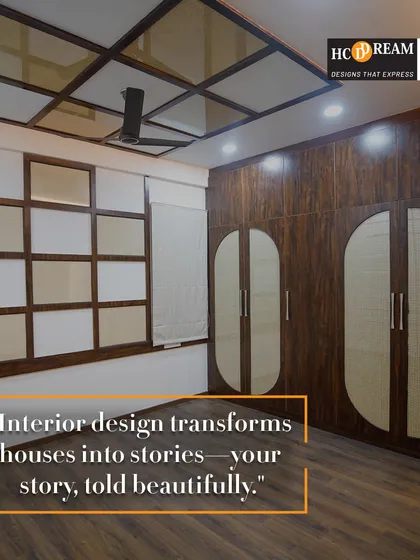 We believe interior design transforms houses into stories. This bedroom is a testament to that belief, with its rich wooden textures, custom wardrobe design, and a unique coffered ceiling. It’s a personal retreat crafted to be a beautiful chapter in our client's story.