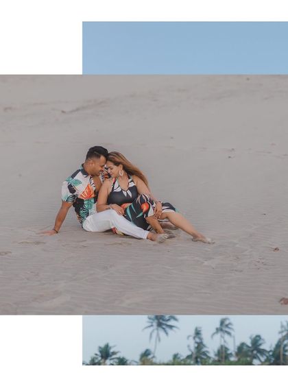 A relaxed moment on the sand. This photo captures the feeling of just sitting together, enjoying the beach and each other's company.
