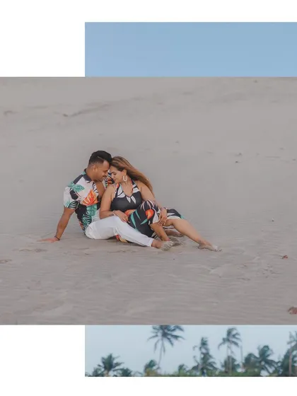 A relaxed moment on the sand. This photo captures the feeling of just sitting together, enjoying the beach and each other's company.