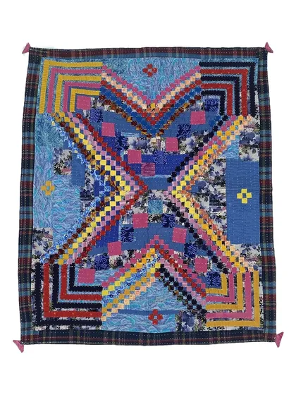 This untitled textile work is a collaboration between artist Anitha N Reddy and Husenbi Jamadar of the Siddi Quilters. Hand-stitched from upcycled cotton, these quilts are powerful works of art, rich with the memory, labor, and heritage of the Siddi community.