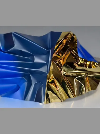 "Meteor 131" captures the moment the sun hits the ocean, with warm gold and cool blue tones meeting on a single stainless steel form.