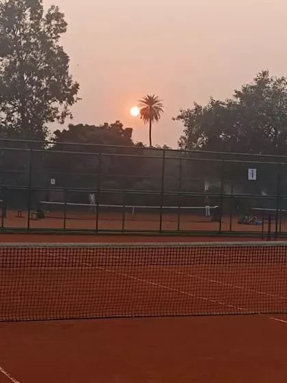 A view across our clay courts at sunset. We maintain a focused and disciplined atmosphere from the first match in the morning to the last practice session in the evening.
