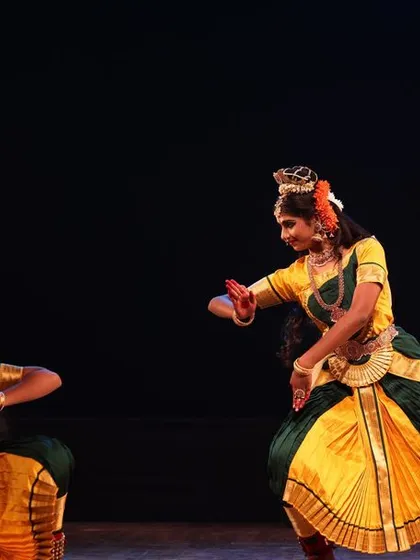 A duet performance from the Sadhana Classical Dance Festival. The dancers' movements are a mirror of each other, creating a beautiful symmetry on stage.
