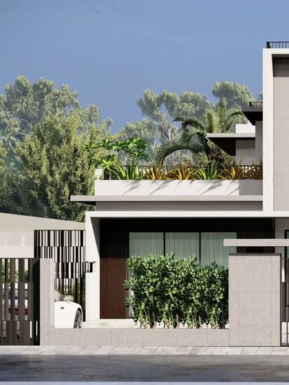 The facade of the Sandeep Mukim Residence features a minimal material palette and clean lines, with integrated planters on the upper level to soften the structure.