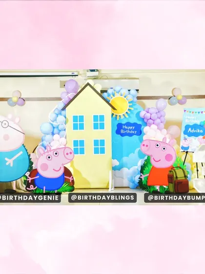 The full Peppa Pig family is here for the celebration. This setup includes cutouts of Peppa, George, and Grandpa Pig, along with a personalized welcome sign and a light-up number '3'.
