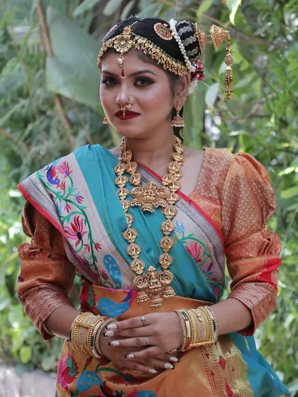 A closer look at a South Indian bridal creation, showcasing the harmony between bold lip color, defined eyes, and elaborate traditional headwear. In my workshops, I teach how to balance these elements for a stunning, regal effect.