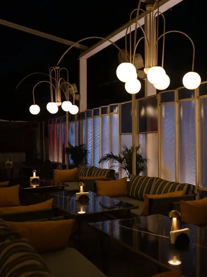 The stylish ambiance of a restaurant set up for a birthday party. We capture the atmosphere of your chosen venue.