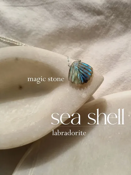 Another view of the labradorite sea shell pendant. It's a magic stone that's perfect for anyone who loves the ocean and believes in a little bit of magic.