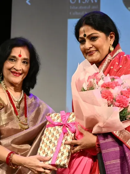Receiving a gift and flowers from senior dancer Ranjana Gauhar. I deeply value honours bestowed by fellow artists.