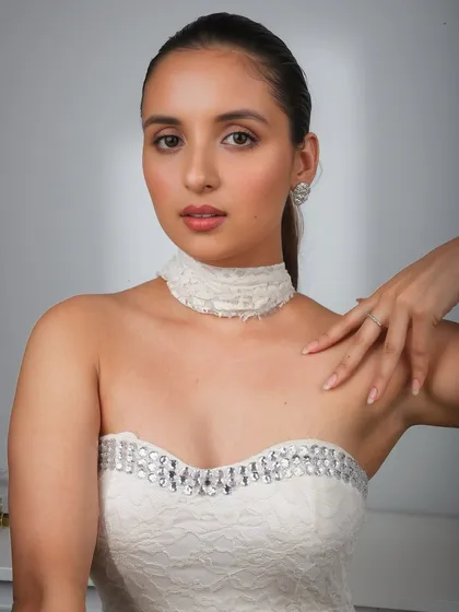 Serving angel energy with this soft glam. The white dress and diamond jewelry are paired with a soft, ethereal makeup look.