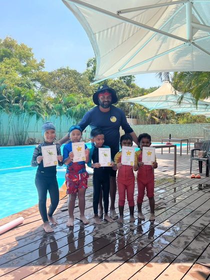 Nisha Millet Swimming Academy - Swimming Lessons Our Program: From Tadpole to Marlin photo 20