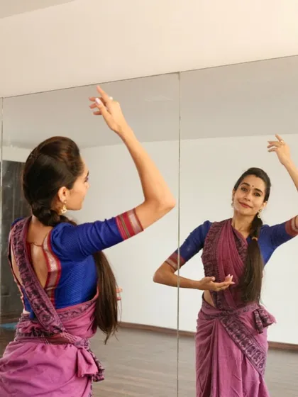 The full-length wall mirror is essential for refining technique and checking your alignment. It covers the entire wall, giving you a perfect reflection from any angle in the room.