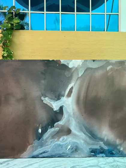 An 8ft x 4ft abstract piece with earthy brown tones, part of the series for the Lucknow cafe. The fluid style connects all the paintings in the space.