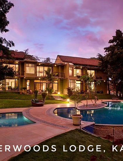 The stunning Waterwoods Lodge in Kabini, with its beautiful pool and modern architecture, offers a luxurious stay right on the edge of the Nagarhole National Park.