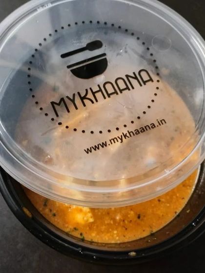 Another look at our Shahi Paneer, packed and ready for delivery. The transparent lid shows the tempting dish inside, ensuring you know exactly what you are getting.