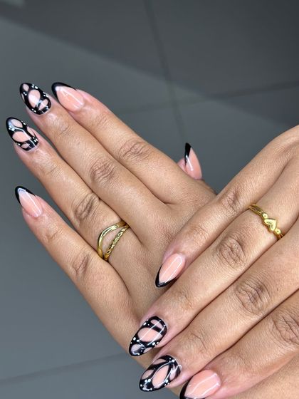 This shot highlights the elegance of the freehand butterfly wing design, a testament to the creativity and skill of our students.