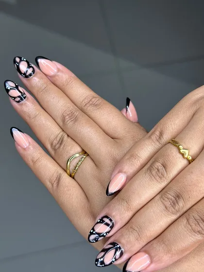 This shot highlights the elegance of the freehand butterfly wing design, a testament to the creativity and skill of our students.