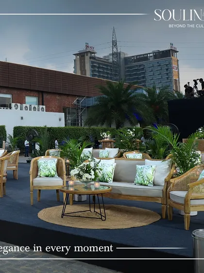 An elegant outdoor lounge setup for a corporate event, demonstrating our ability to create sophisticated and comfortable environments.
