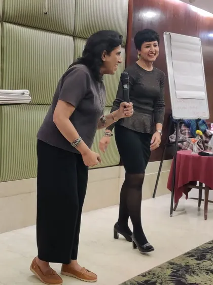Sharing a laugh on stage. Networking events like these are a great source of energy and inspiration.