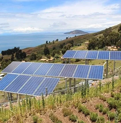 A ground-mounted solar installation in a scenic, remote location. Our community solar projects are designed to make clean energy accessible and affordable for all, revolutionizing power access in diverse communities.