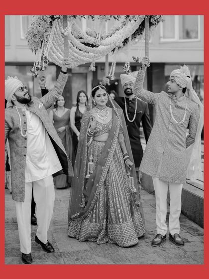 The same beautiful bridal entry, captured in timeless black and white. This format emphasizes the emotion and the grandness of the moment.