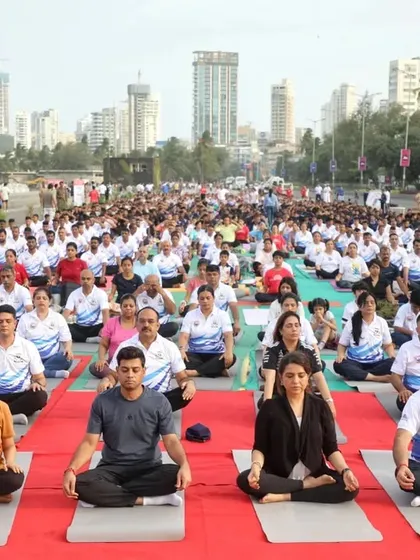 Leading a large "Yoga by the Bay" session at Marine Lines. It is my seva, or service, to make the tools of wellness accessible to everyone, from corporate leaders to the general public, creating a community rooted in health and positivity.