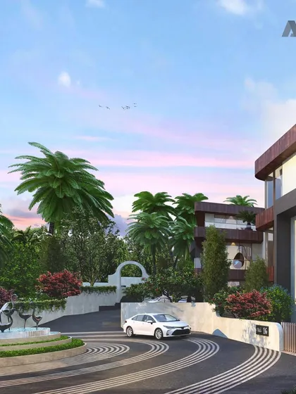 The driveway and entrance to the Evara villa township. The design uses curved lines and integrated landscaping to create a grand and welcoming sense of arrival.