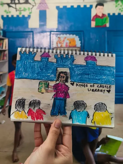 Sometimes, the most powerful stories are the ones told through a child's eyes. A young artist at our Kings of Castle Library captured this beautiful moment of a story session. This drawing is a heartfelt reminder of the safe and inspiring world we build together.