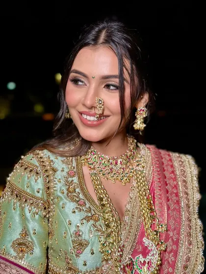 A final, smiling portrait of the modern Maharashtrian bride, looking radiant and confident.