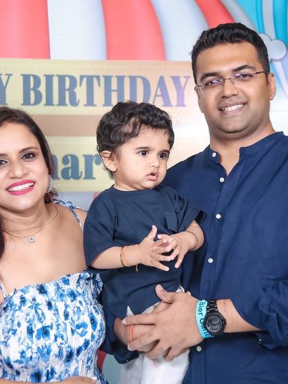 A vibrant 'Minions' themed birthday party, with yellow and blue decor, character cutouts, and fun props, creating a mischievous and joyful atmosphere.