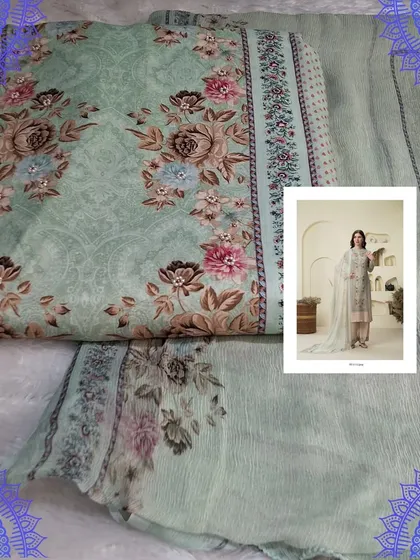 A soft sea-green dress material with a delicate floral digital print. The muslin fabric and the soothing color make it a perfect choice for a relaxed and elegant look.