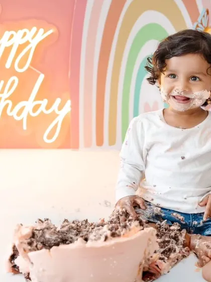 The pure joy of a first birthday cake smash! This little one is having the best time with her rainbow-themed celebration. I love capturing these messy, happy, and unforgettable moments.