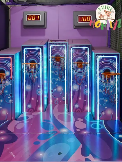 Ready, aim, score! Our neon-lit arcade basketball zone is a huge hit with kids who love a friendly challenge. It’s a great way for them to practice their coordination while having a blast.