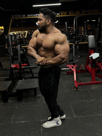 Side chest pose. Every action in the gym is a step towards the dream.