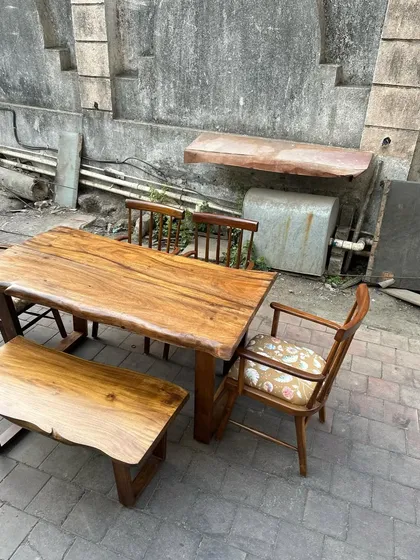 The live-edge dining set, showing the bench and chairs.