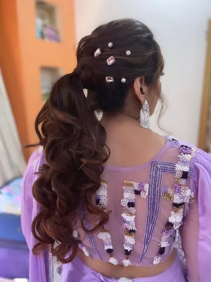 Another angle of the crystal-adorned ponytail, showing its sparkle and texture.