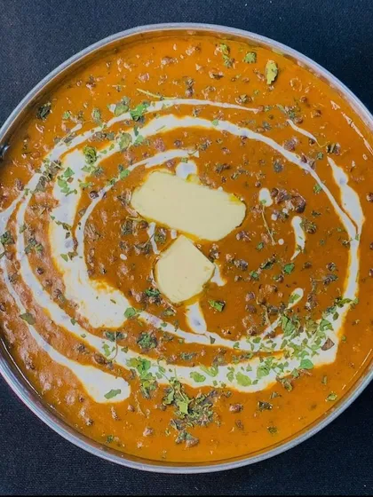 My Dal Makhni is a true crowd-pleaser, slow-cooked to perfection for a rich and creamy texture. It's topped with a dollop of butter and fresh cream, making it a must-have for any North Indian vegetarian catering menu in Gurgaon.