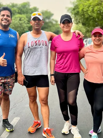 The group posing together during an anniversary run. We love celebrating the love and partnership of our members.