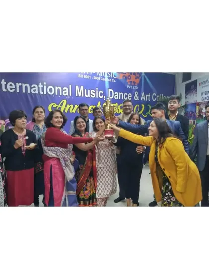 Success is a team effort. Our instructors and senior students celebrate a win at our annual fest, showcasing the supportive and collaborative spirit of our college community.